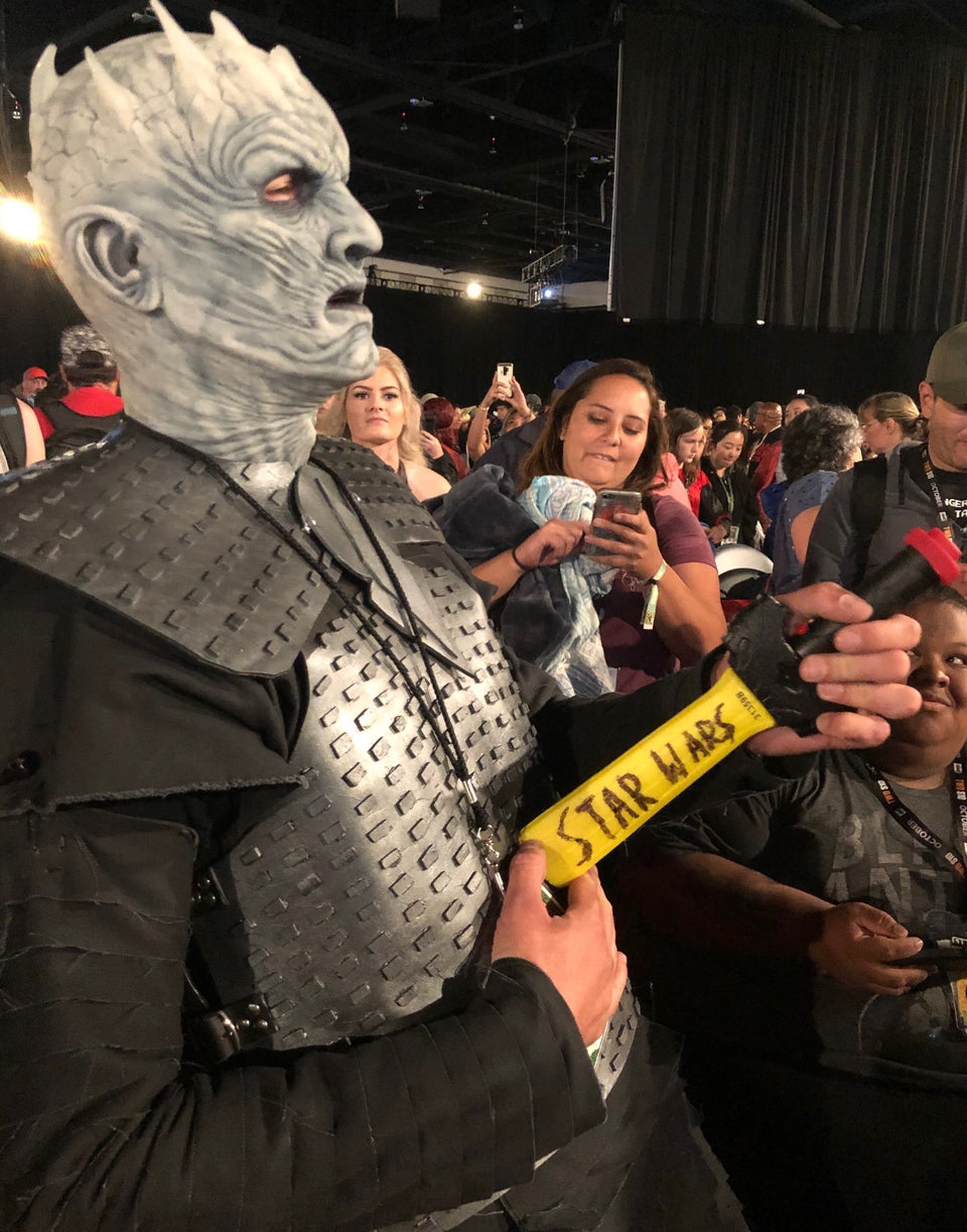 A Night King cosplayer with a dagger saying “Star Wars” on the side at Comic-Con. Fans had...
