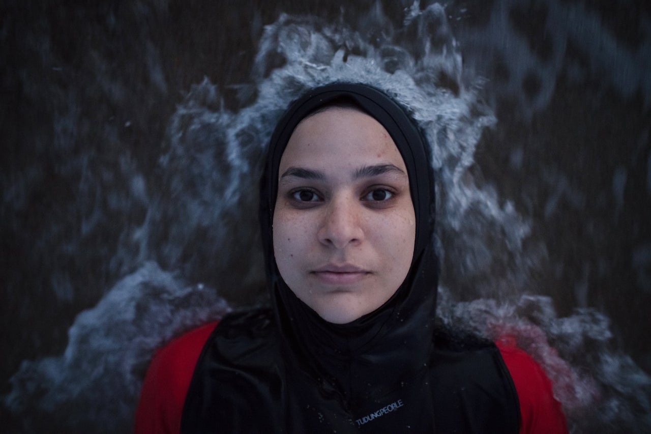 Manar Hussein at a beach in New Jersey June 26, 2019. This was Hussein's first time wearing a burkini in the water.