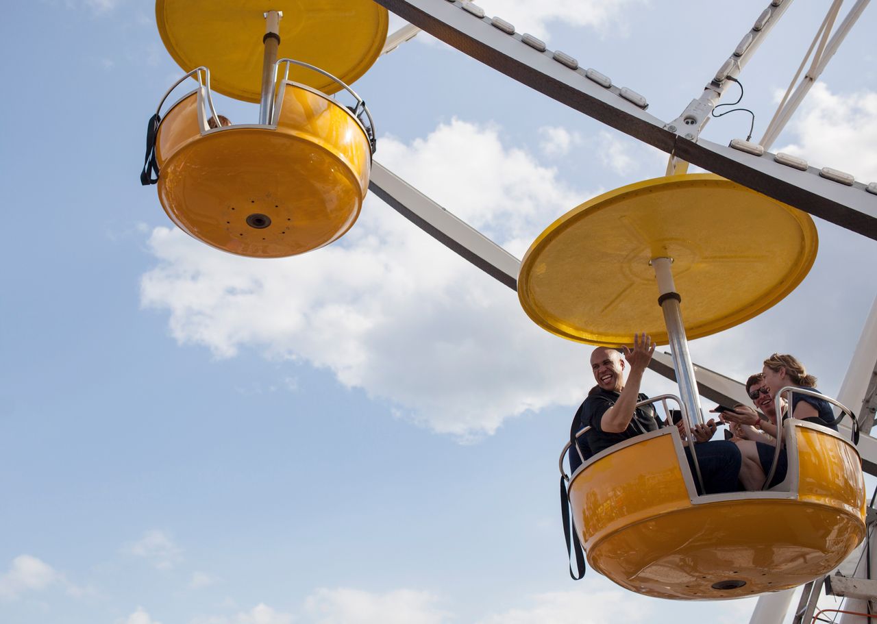 Sen. Cory Booker (D-N.J.) rides the Ferris wheel with reporters on Saturday, Aug. 10, 2019, at the Iowa State Fair.