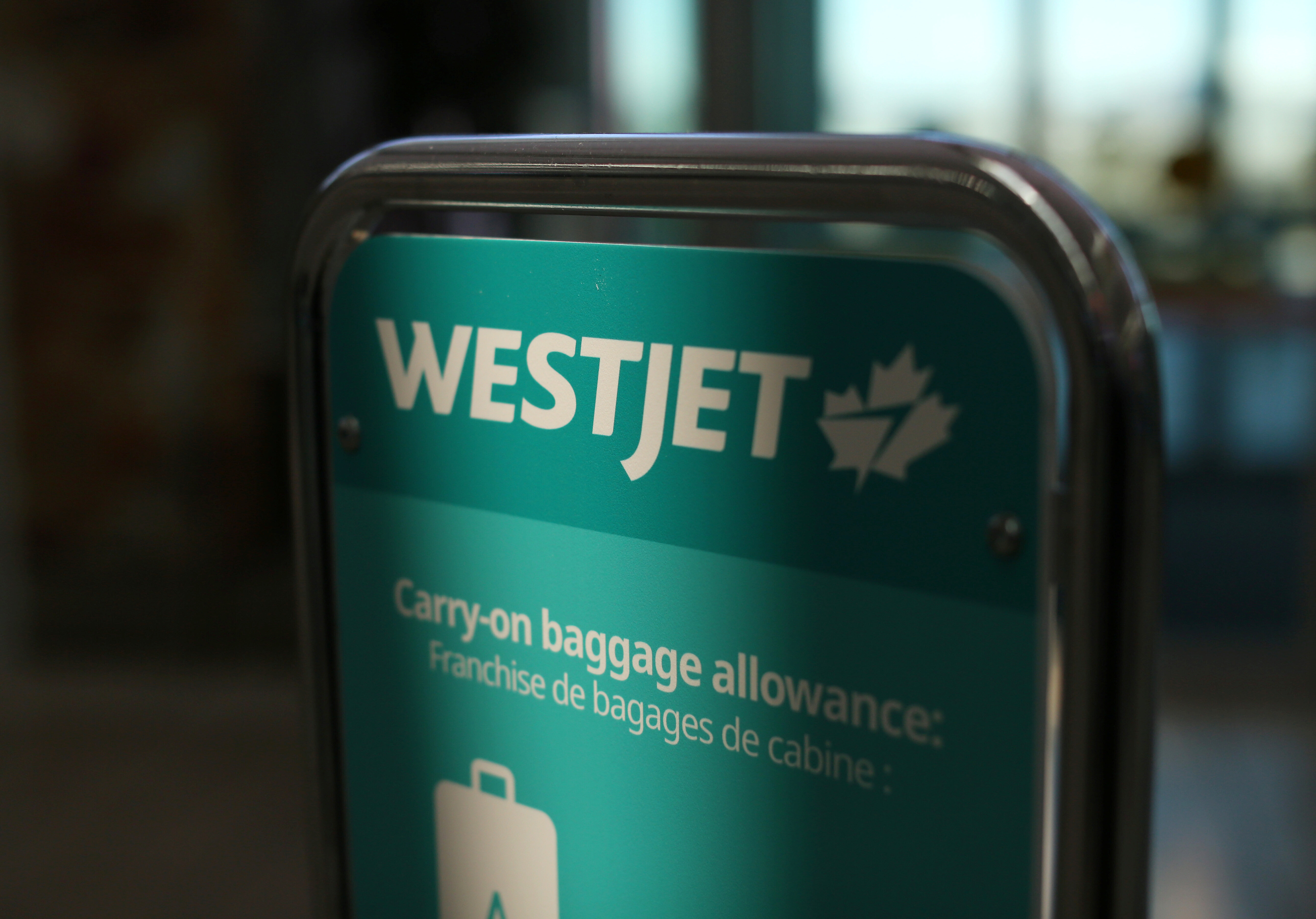 westjet carry on allowance