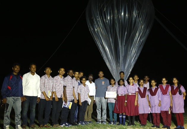 Swaero students stand with the Swaerosat 1 payload, and Dr RS Praveen Kumar (centre, grey