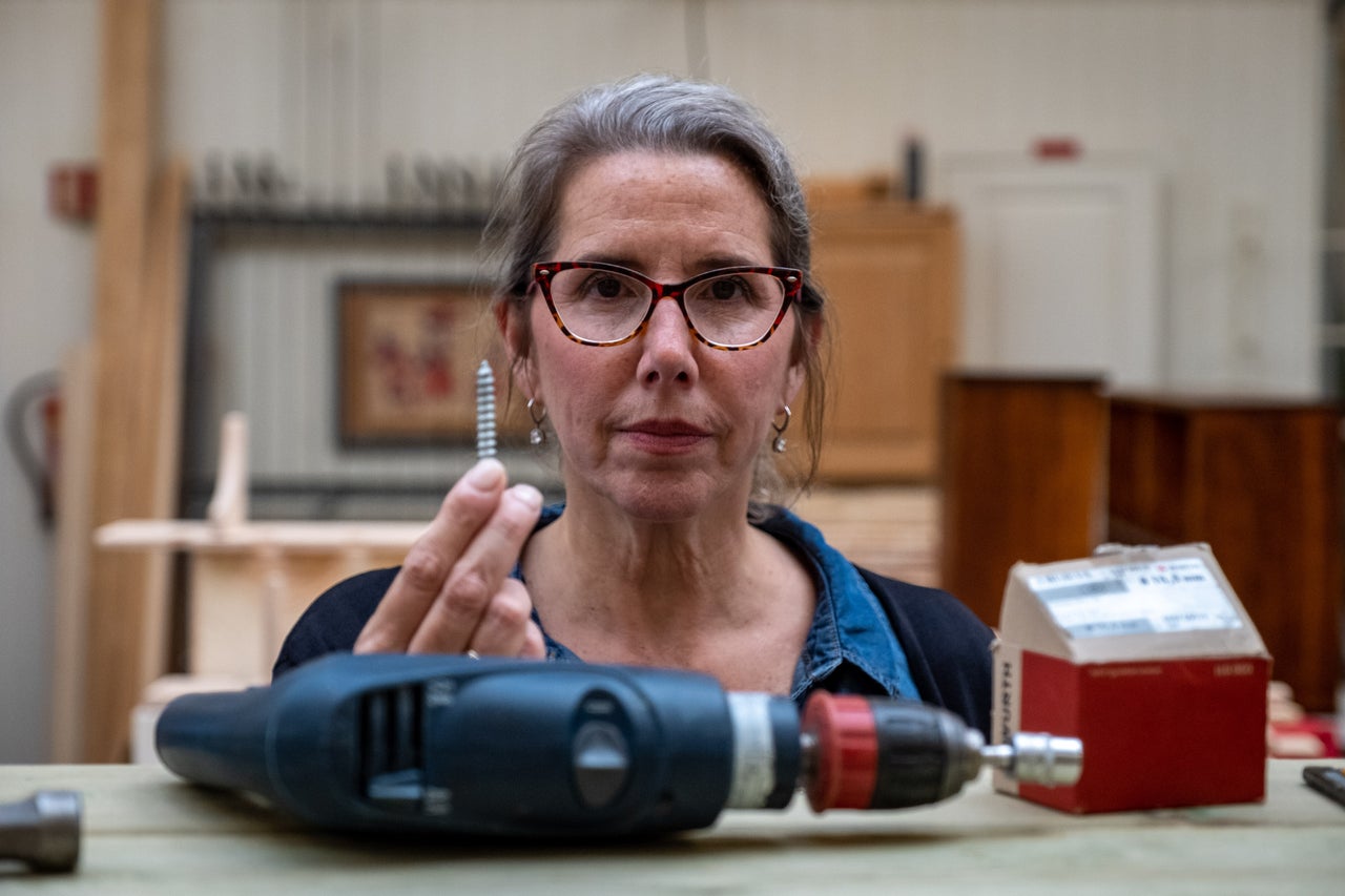 Marirosa Lamas, superintendent of SCI Chester, with tools and screws available to inmates in the wood shop at Ringerike.