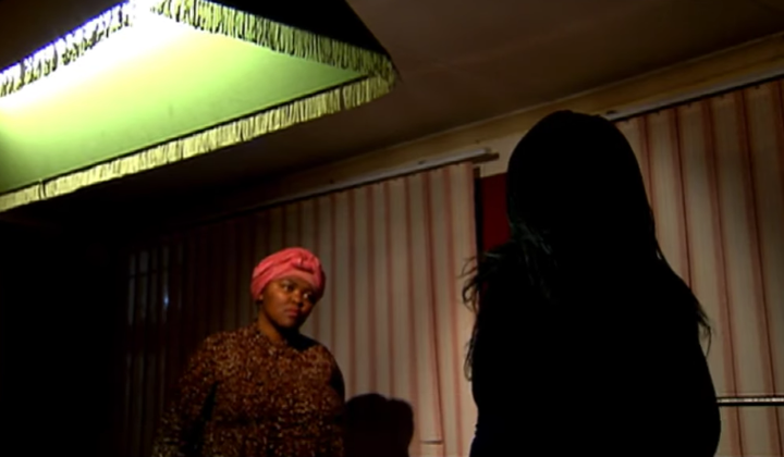 The mother, whose silhouette can be seen in this image from a SABC News interview, has chosen to remain anonymous to protect