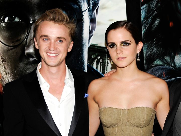 Tom Felton and Emma Watson arrive at the premiere of the final "Harry Potter" movie in July 2011.