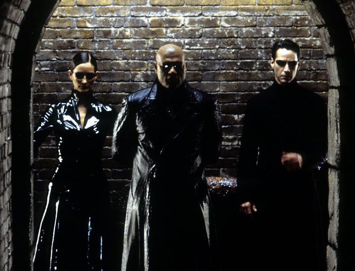 Carrie-Ann Moss, Laurence Fishburne and Keanu Reeves in The Matrix