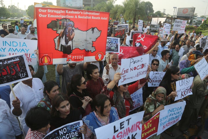 Protesters in Lahore, Pakistan rally to express solidarity with Indian Kashmiris.