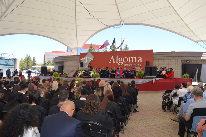 Guests attend Algoma University's 2019 convocation ceremony at Roberta Bondar Park in Sault Ste. Marie, Ont.