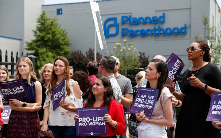 Planned Parenthood has left the federal Title X program because of new restrictions on discussing abortion with patients, implemented by President Donald Trump's administration. 