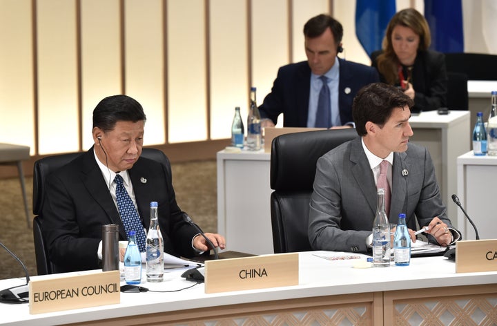 China's President Xi Jinping and Prime Minister Justin Trudeau at the G20 Summit on June 29, 2019 in Osaka, Japan. 