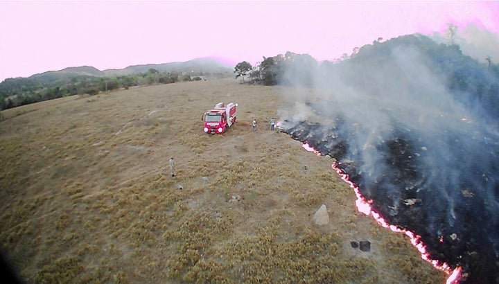 A drone photo released by the Corpo de Bombeiros de Mato Grosso on Tuesday shows brush fires burn in Mato Grosso state, Brazil.