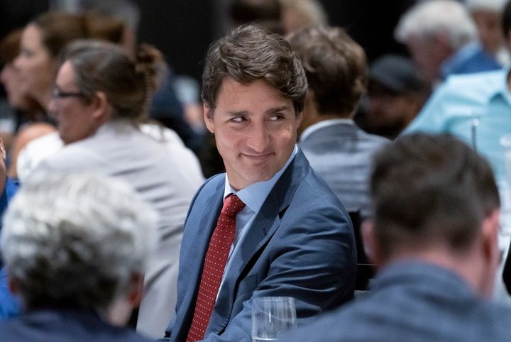 Prime Minister Justin Trudeau smiles as he is introduced at a luncheon with the Montreal Council on Foreign Relations in Montreal on Aug. 21, 2019.