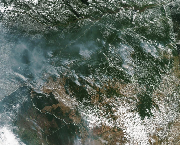 This satellite image provided by NASA on Aug. 13 shows several fires burning in Brazil;s Amazon rainforest. Brazil's National Institute for Space Research said the country has seen a record number of wildfires this year, counting 74,155 as of Tuesday.