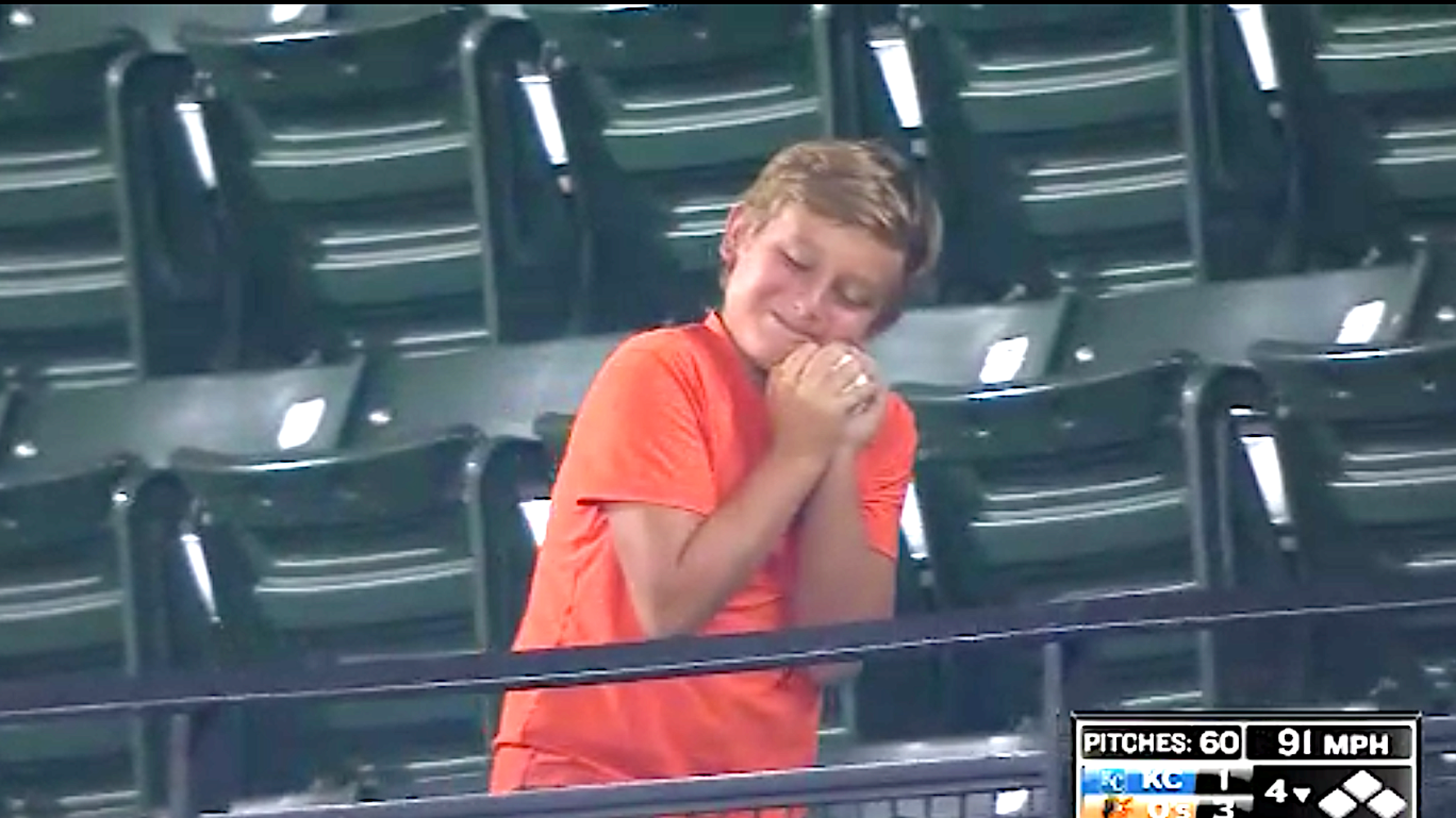 Baby Orioles fan couldn't decide if he wanted this foul ball or not