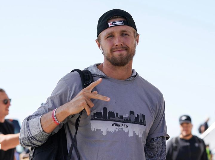 Oakland Raiders player AJ Cole III pictured wearing a shirt that says "Winnipeg, Alberta" ahead of a NFL pre-season game in the city.