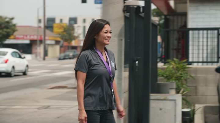 Yvette Enrique walking to the Asian American Drug Abuse Prevention office.