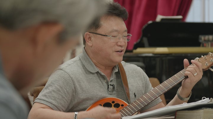 Pastor Young Ho Han singing for the weekly gathering of parents of Nanoom's residents.