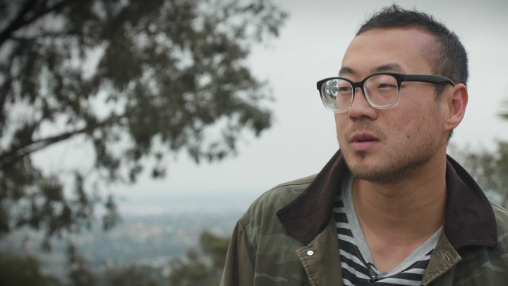 Duhui Lee looks over the Los Angeles skyline.