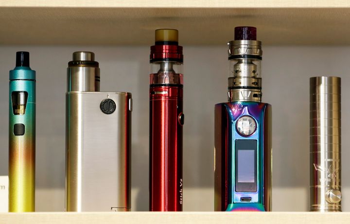 E-cigarettes placed on a shelf for sale in a store in Prague, Czech Republic, January 31, 2019. 