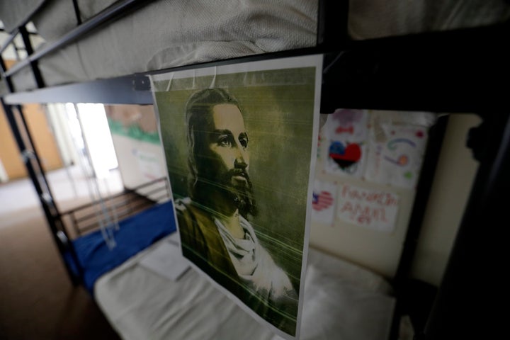 Photos and decorations cover the walls of a dormitory at the U.S. government's newest holding center for migrant children in Carrizo Springs, Texas, Tuesday, July 9, 2019. 