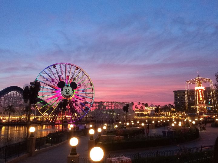Tourists wander around Disney's California Adventure located adjacent to Disneyland, a major tourist attraction in Anaheim. The infected teen visited the park as well as several other popular attractions in the area, authorities said.