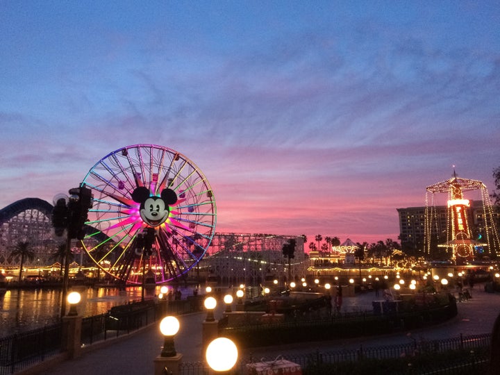 Tourists wander around Disney's California Adventure located adjacent to Disneyland, a major tourist attraction in Anaheim. T