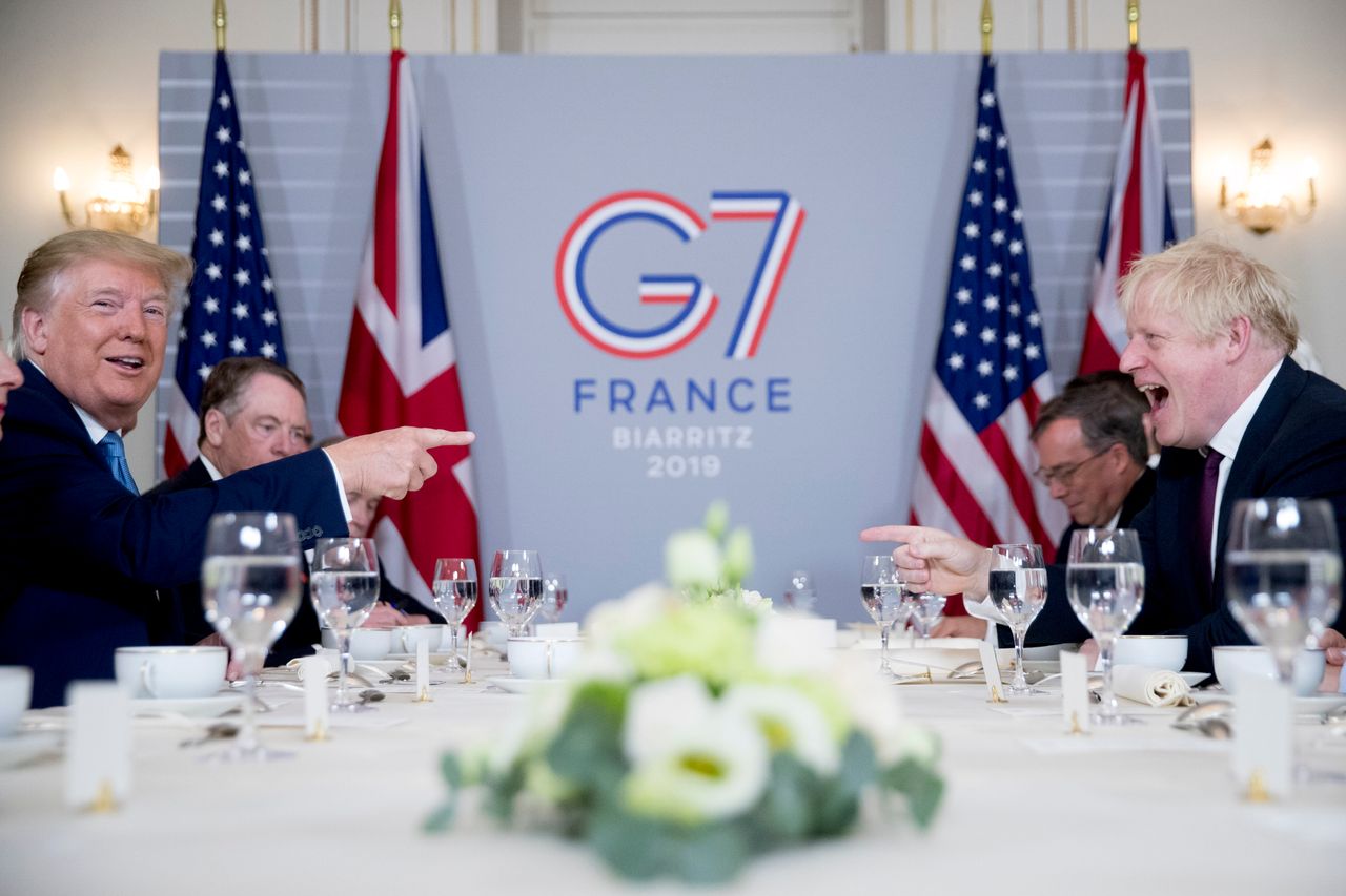 Donald Trump and Boris Johnson attend a working breakfast at the Hotel du Palais on the sidelines of the G7 summit in Biarritz, France.