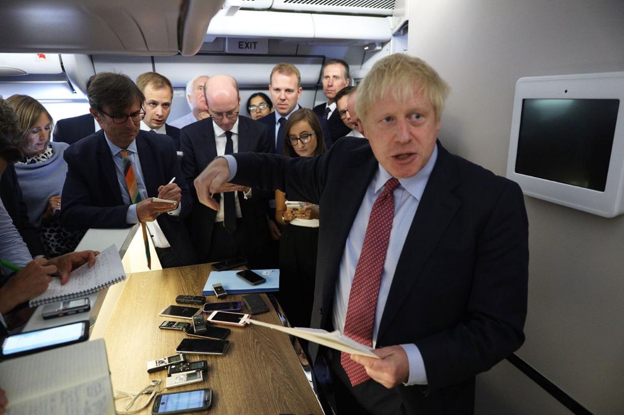 Boris Johnson with journalists on board the RAF Voyager