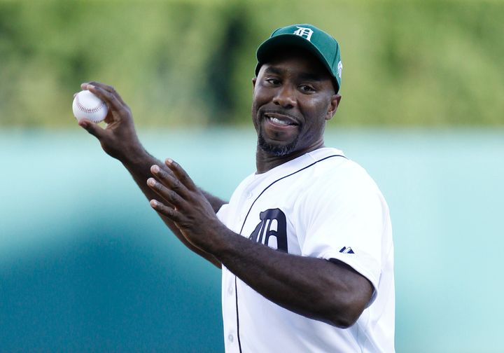 Mateen Cleaves throws out a ceremonial first pitch before the Detroit Tigers baseball game against the Texas Rangers on Aug. 21, 2015, in Detroit.