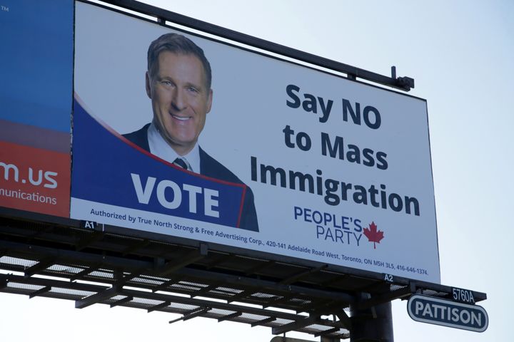 A billboard featuring the portrait of People’s Party of Canada (PPC) leader Maxime Bernier and its message "Say NO to Mass Immigration" is displayed in Toronto, Ontario, Canada August 25, 2019. REUTERS/Chris Helgren