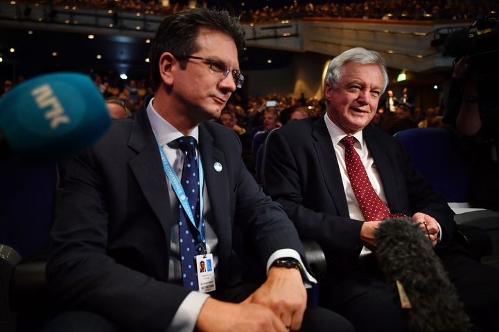 Conservative MP's Steve Baker (L) and David Davis wait for a speech by British politician Boris Johnson during a fringe event on the sidelines of the third day of the Conservative Party Conference 2018 at the International Convention Centre in Birmingham, on October 2, 2018. (Photo by Ben STANSALL / AFP) (Photo credit should read BEN STANSALL/AFP/Getty Images)