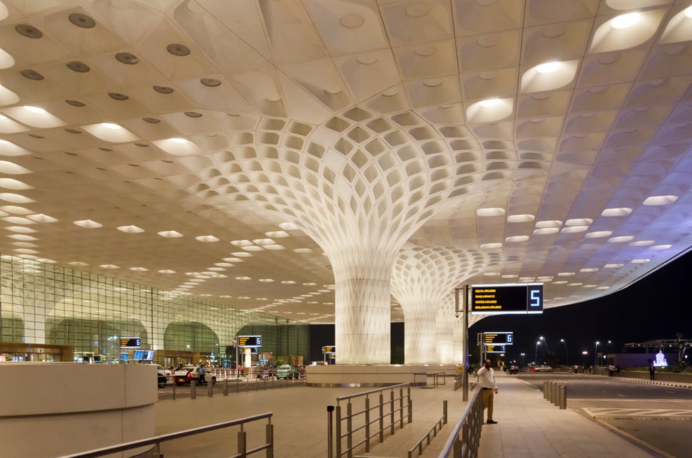 Mumbai, India - January 5, 2015: Travelers visit Chhatrapati Shivaji International Airport. The New Terminal 2, International Departures on January 5, 2015 in Mumbai, India. Skidmore, Owings and Merrill (SOM) was the architectural designer of the project.