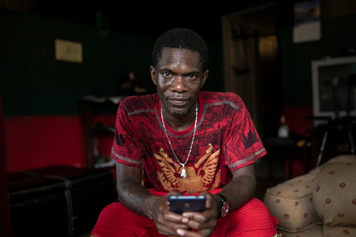 Joshua K. Love sits in the living room of his home in Greenwood, Miss., Saturday, June 8, 2019. Love says he was sexually abu