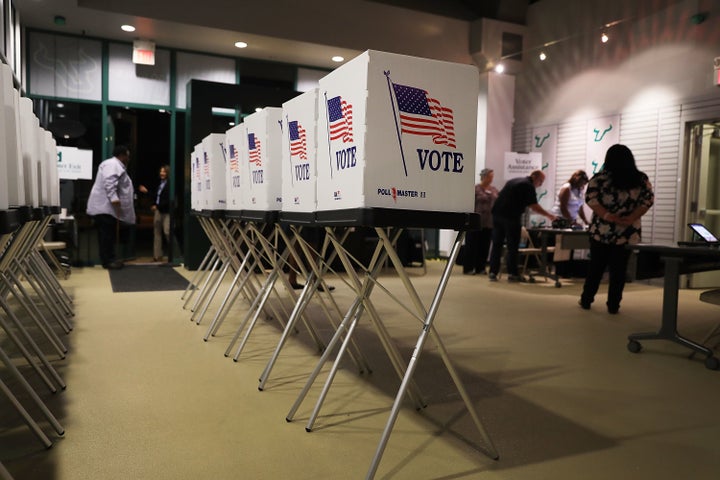 TAMPA, FL - OCTOBER 22: Voting booths are setup at the Yuengling center on the campus of University of South Florida as work