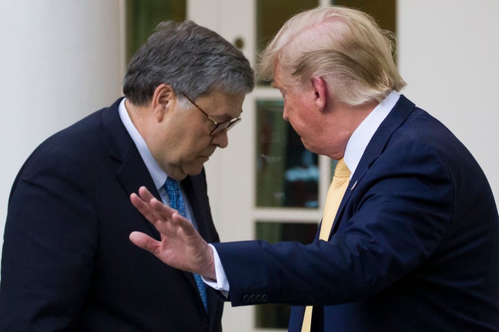 Attorney General William Barr and President Donald Trump turn to leave after speaking in the White House Rose Garden on July