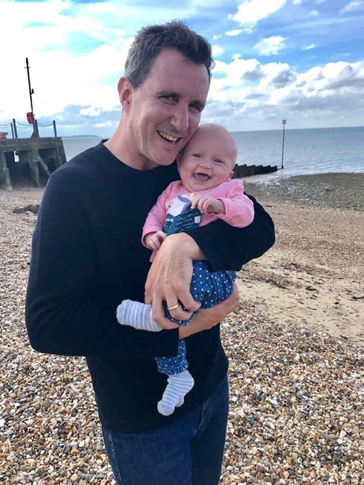 Undated family handout picture of Jonathan Goldstein with his seven-month-old daughter Saskia. 