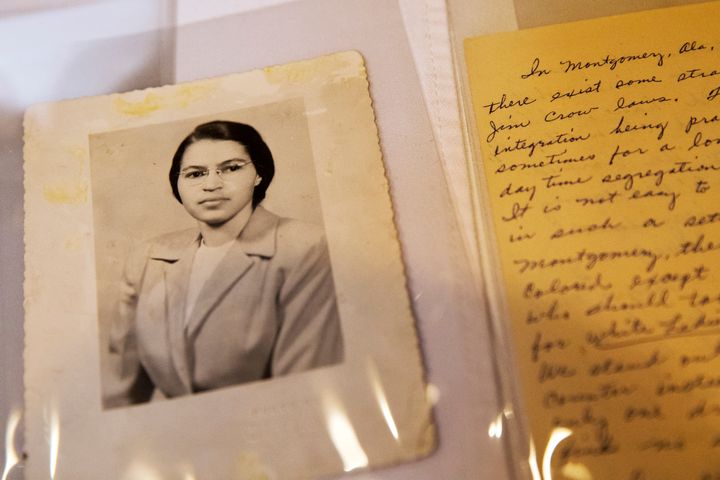 FILE - In this Jan. 29, 2015 shows a photograph of Rosa Parks circa the 1950's and a paper written by Parks about segregation are some of the items in the Rosa Parks archive, seen during a media preview at the Library of Congress, Madison Building in Washington. The family of civil rights activist Rosa Parks is thankful her memorabilia and personal items finally have a safe home. The items are on loan to the Library of Congress. They were purchased last year by a charitable foundation run by Howard Buffett, son of billionaire investor Warren Buffett. (AP Photo/Jacquelyn Martin, File)