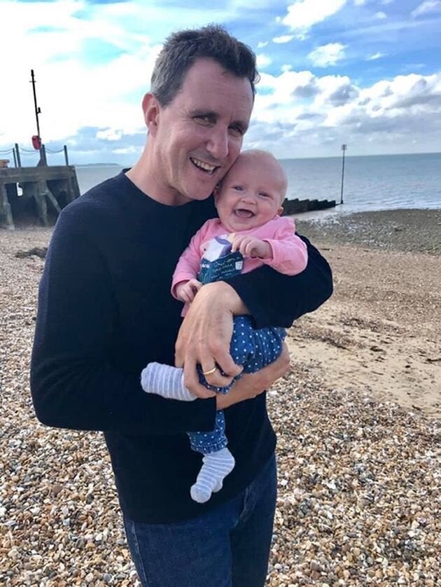 Undated family handout picture of Jonathan Goldstein with his seven-month-old daughter Saskia.
