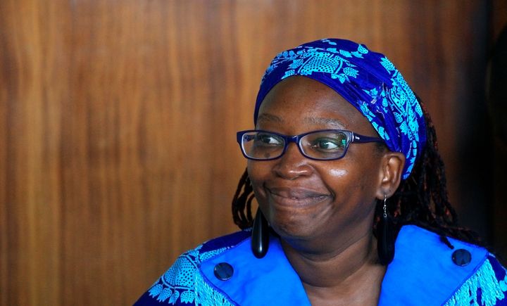 Ugandan prominent academic Stella Nyanzi smiles as she appears at Buganda Road court charged with cybercrimes after she posted profanity-filled denunciations of president Yoweri Museveni on Facebook, in Kampala, Uganda April 25, 2017. REUTERS/James Akena