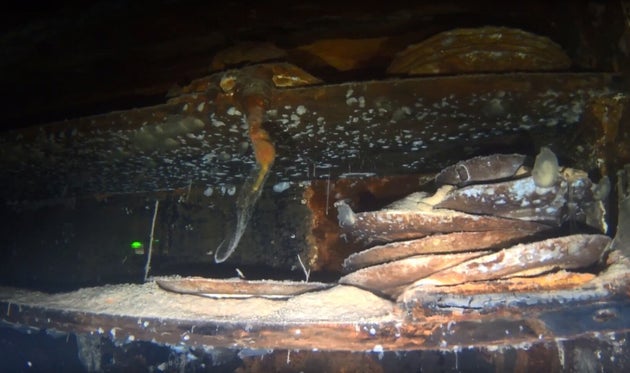 More flatware is seen on shelving in the interior of the HMS Terror shipwreck in an undated photo taken...