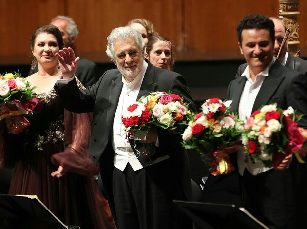Spanish opera singer Placido Domingo (C), accused of sexual harassment, is seen on stage during the performance...