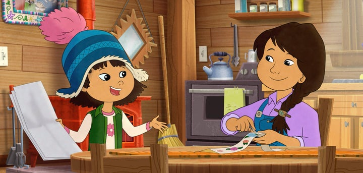 This image released by PBS shows characters Molly, voiced by Sovereign Bill, left, and her mother, voiced by Jules Koostachin in a scene from the animated series "Molly of Denali."