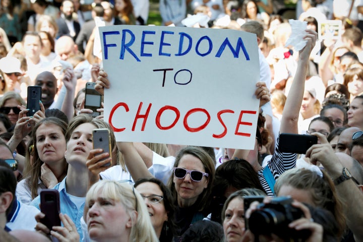 A crowd of supporters of a religious exemption to childhood vaccination rally outside New York's state Supreme Court after a hearing challenging the constitutionality of the Legislature's repeal of the religious exemption to vaccination in August.