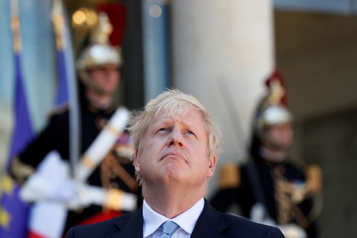 British Prime Minister Boris Johnson reacts during a joint statement with French President Emmanuel Macron (not seen) before a meeting on Brexit at the Elysee Palace in Paris, France, August 22, 2019. REUTERS/Gonzalo Fuentes