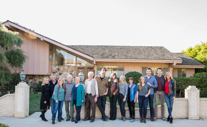 Brady Bunch cast: (left to right) Maureen McCormack / Marsha Brady, Christopher Knight / Peter Brady, Susan Olsen / Cindy Brady, Mike Lookinland / Bobby Brady, Eve Plumb / Jan Brady, and Barry Williams / Greg Brady with HGTV stars: Steve Ford, Leanne Ford, Jasmine Roth, Karen E. Laine, Mina Starsiak, Jonathan Scott, Drew Scott, and Lara Spencer in front of the original Brady home in Studio City, California, as seen on "A Very Brady Renovation."