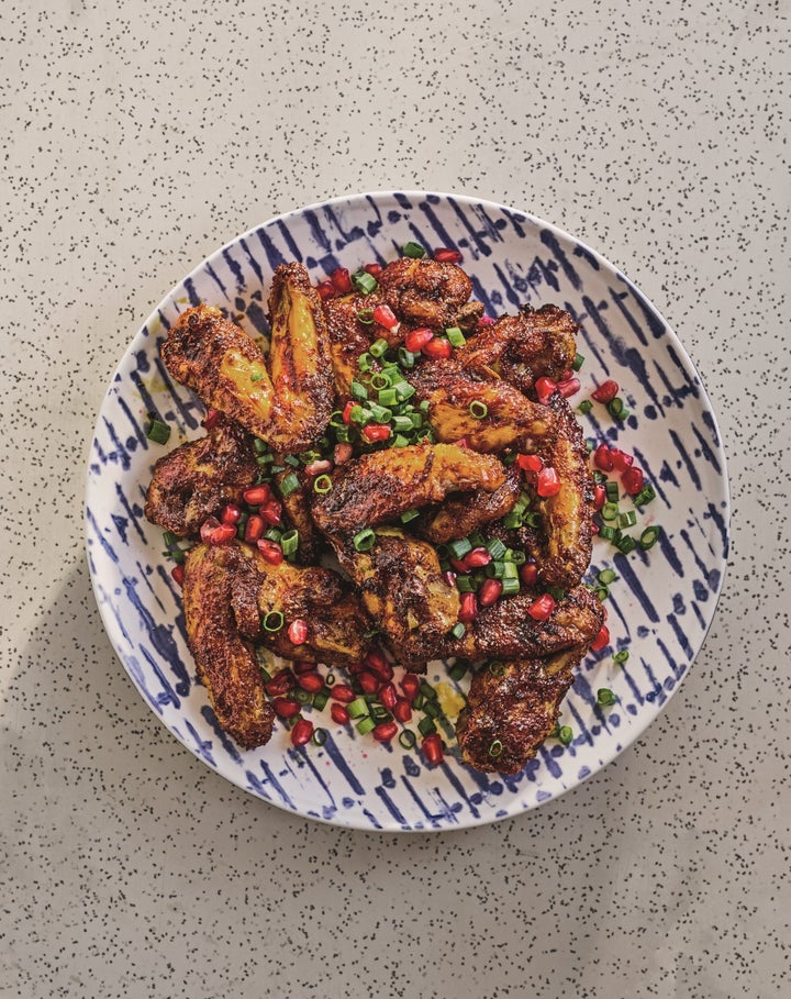 Sour lime and pomegranate wings from Adeena Sussman's new cookbook "Sababa."