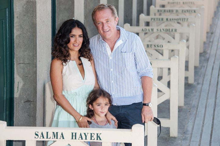 Salma Hayek poses with her daughter, Valentina Paloma Pinault, and her husband, Francois-Henri Pinault, in 2012.