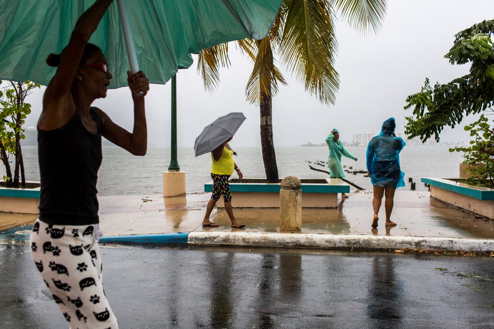 A group of ladies walks along the Fajardo Malecon after the storm passed in Fajardo, Puerto Rico.