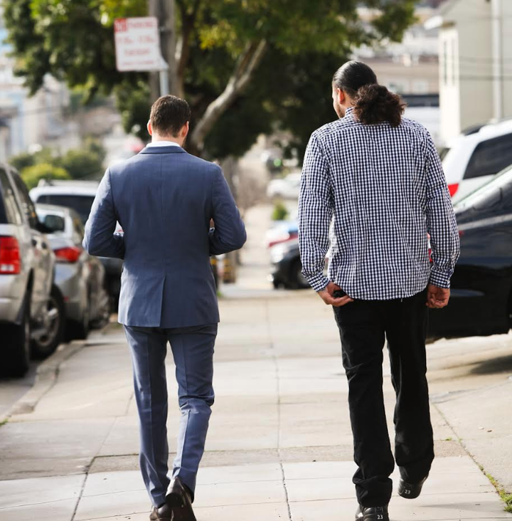 Boudin and a former client walking down a San Francisco street.