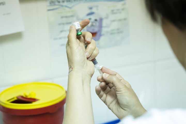 HADERA, ISRAEL - MAY 12: Nurse Gavriella Cherni prepares a measles vaccine before giving to a patient on May 12, 2019 in Hadera, Israel. Israel faces an unusual outbreak of measles in the past year. According to Israel's Ministry of Health, some 3,600 cases of measles have been reported in Israel between March 2018 to February 2019. (Photo by Amir Levy/Getty Images)