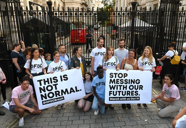 Members of the anti-Briexit Our Future, Our Choice (OFOC) a youth movement supporting a People's Vote on the Brexit deal, demonstrate outside the gates to Downing Street in central London on August 28, 2019. - British Prime Minister Boris Johnson announced Wednesday that the suspension of parliament would be extended until October 14 -- just two weeks before the UK is set to leave the EU -- enraging anti-Brexit MPs. MPs will return to London later than in recent years, giving pro-EU lawmakers less time than expected to thwart Johnson's Brexit plans before Britain is due to leave the European Union on October 31. (Photo by DANIEL LEAL-OLIVAS / AFP) (Photo credit should read DANIEL LEAL-OLIVAS/AFP/Getty Images)